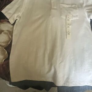 Boys white shorts to match.